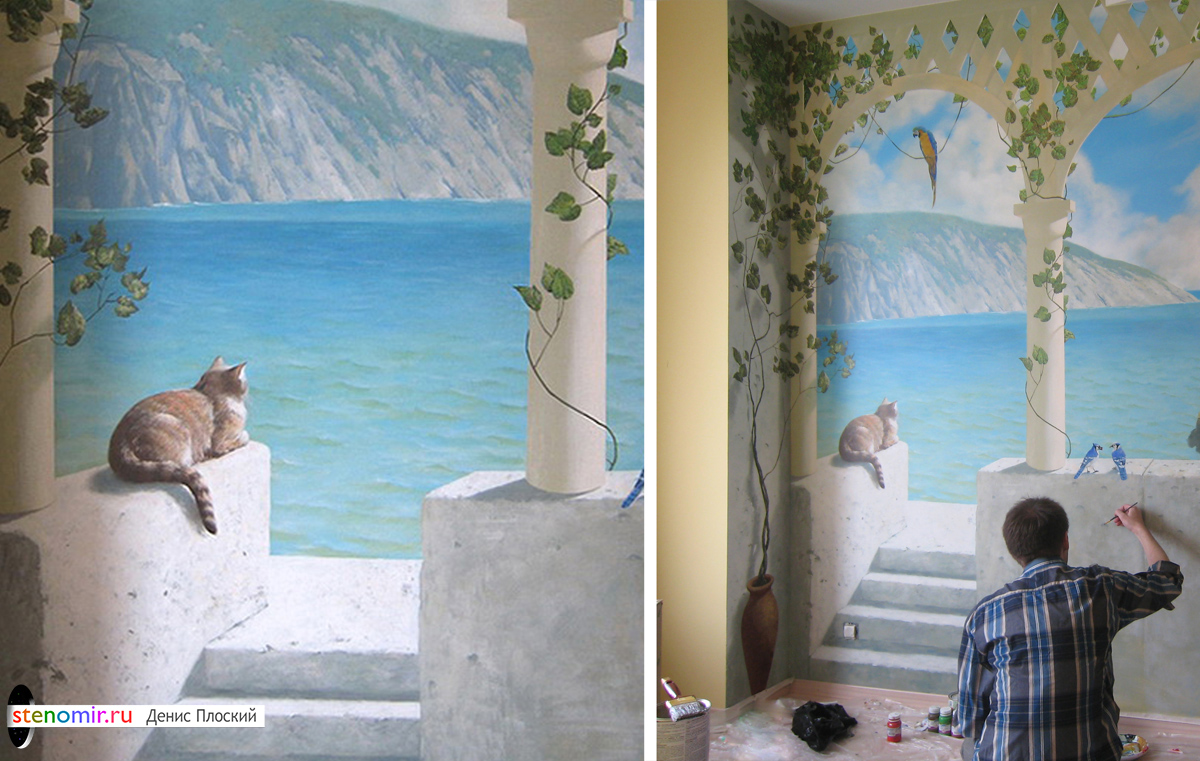 Кошка с морским пейзажем на стене в детской комнате.